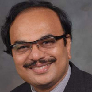 Dr Nirmal Surya